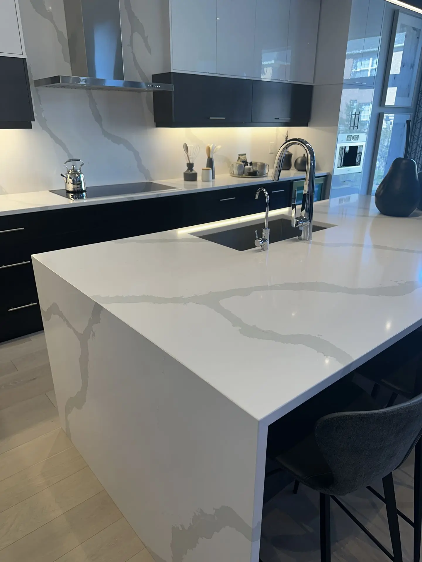Kitchen island and counter with sink and stove