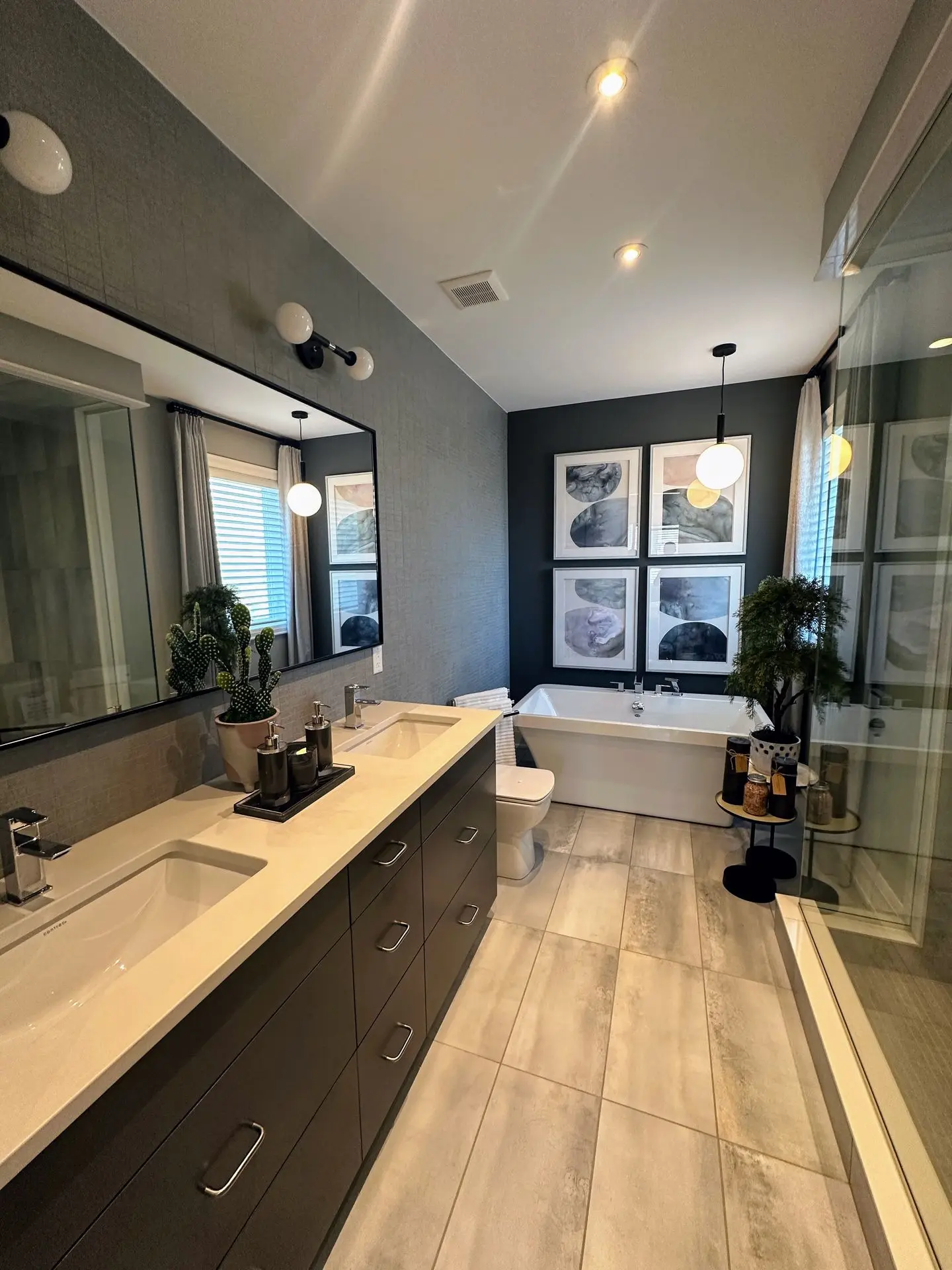 Master bathroom with tub and shower and duel sinks